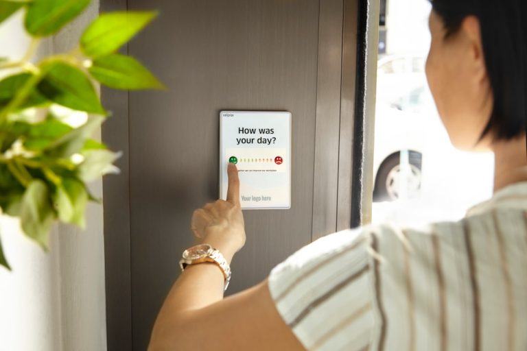 Feedback button device representing customer exit survey for churn analysis